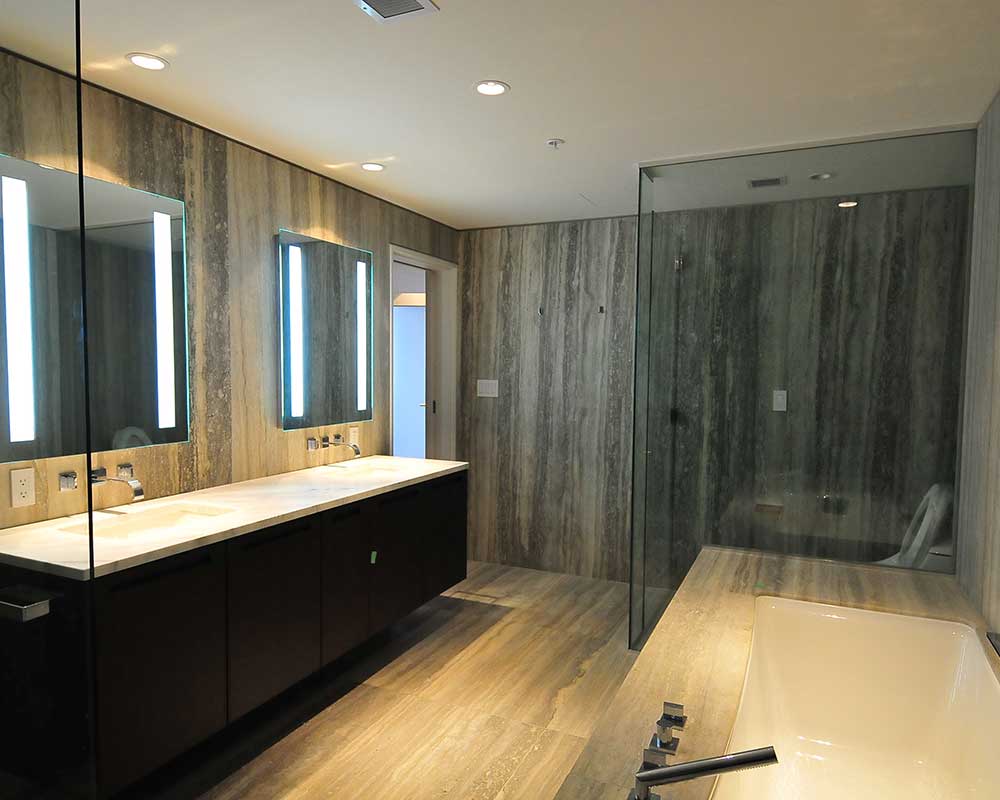 marble bathroom counters and bathtub surround